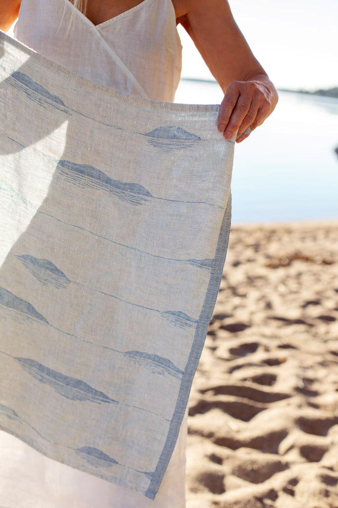 Blått strandhåndkle i lin
